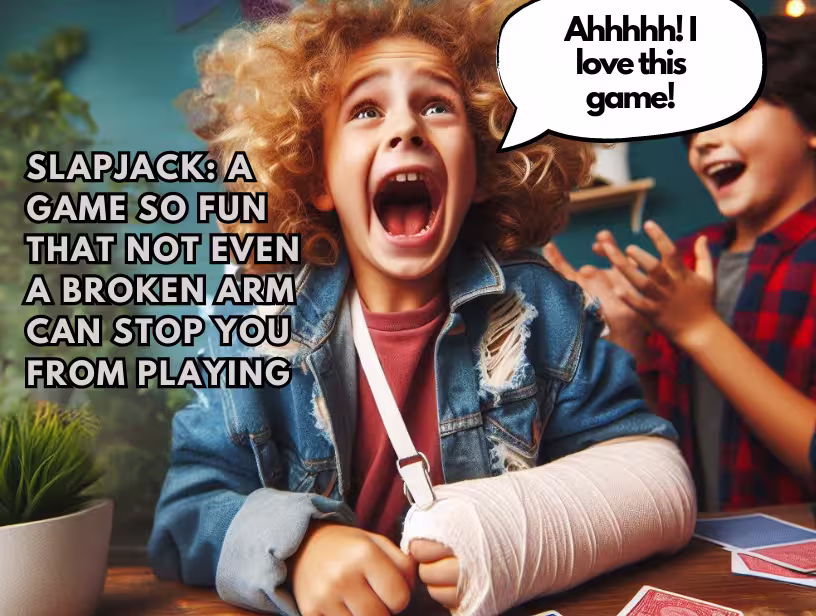 Excited-child-with-a-cast-enjoying-playing-the-slapjack-card-game-at-a-table.