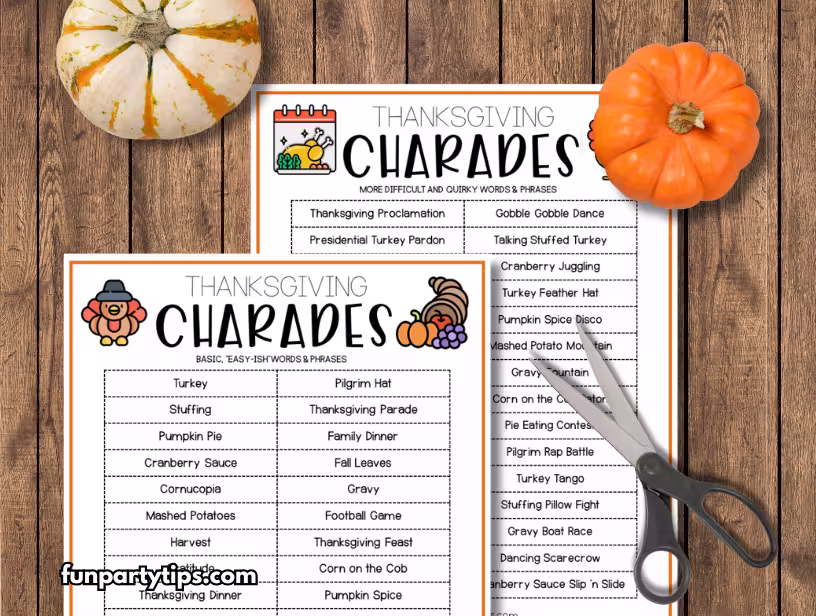 Two-free-printable-Thanksgiving-charades-game-sheets-featuring-basic-and-more-challenging-words-are-shown-with-decorative-pumpkins-and-scissors-on-a-wooden-surface.