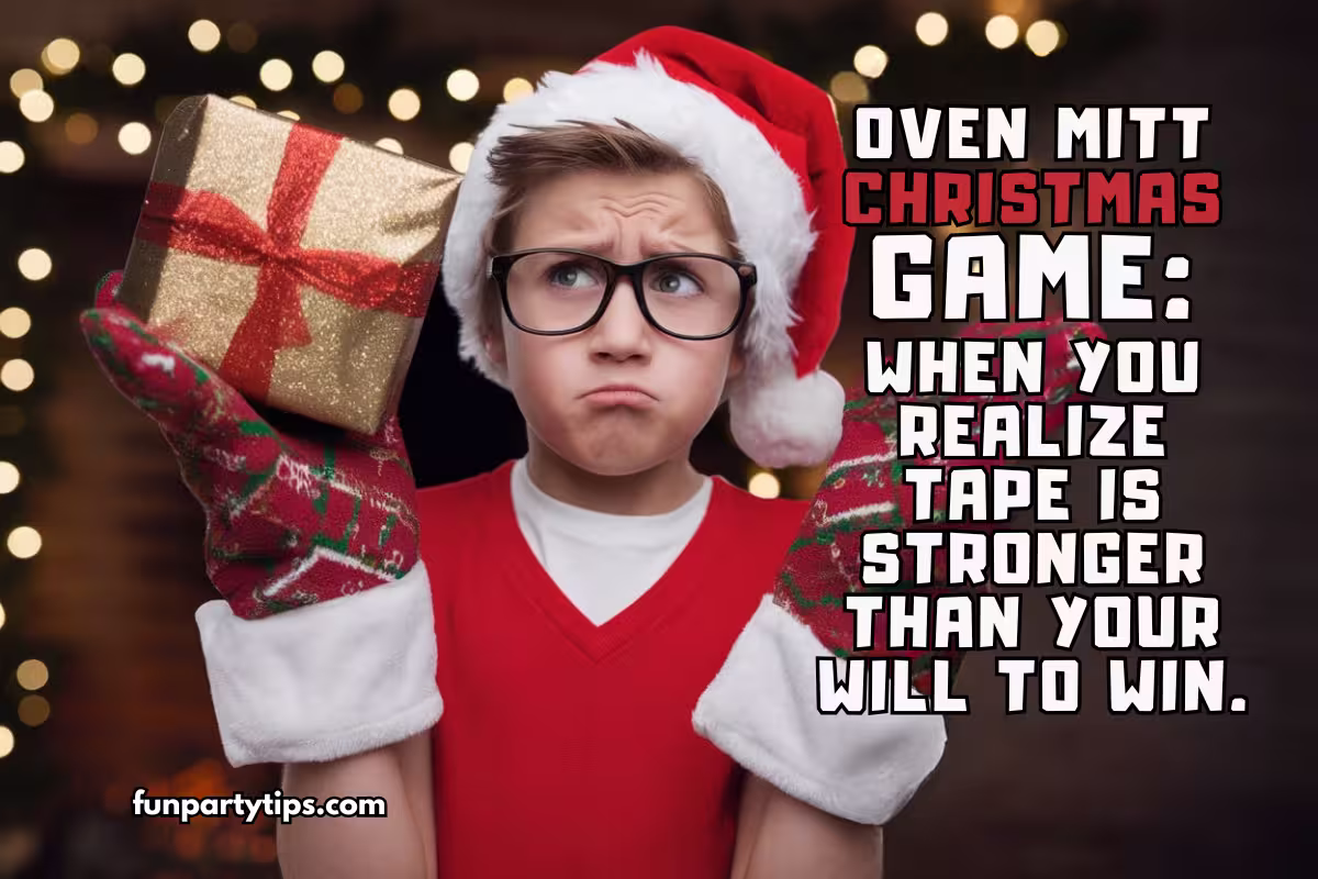 A-boy-wearing-a-Santa-hat-and-glasses-holding-a-gold-gift-box-with-a-red-bow-while-wearing-festive-oven-mitts.-He-has-a-puzzled-expression-as-he-stands-in-front-of-a-decorated-Christmas-tree.-The-text-reads-"Oven-Mitt-Christmas-Game:-When-you-realize-tape-is-stronger-than-your-will-to-win."-oven-mitt-christmas-game.