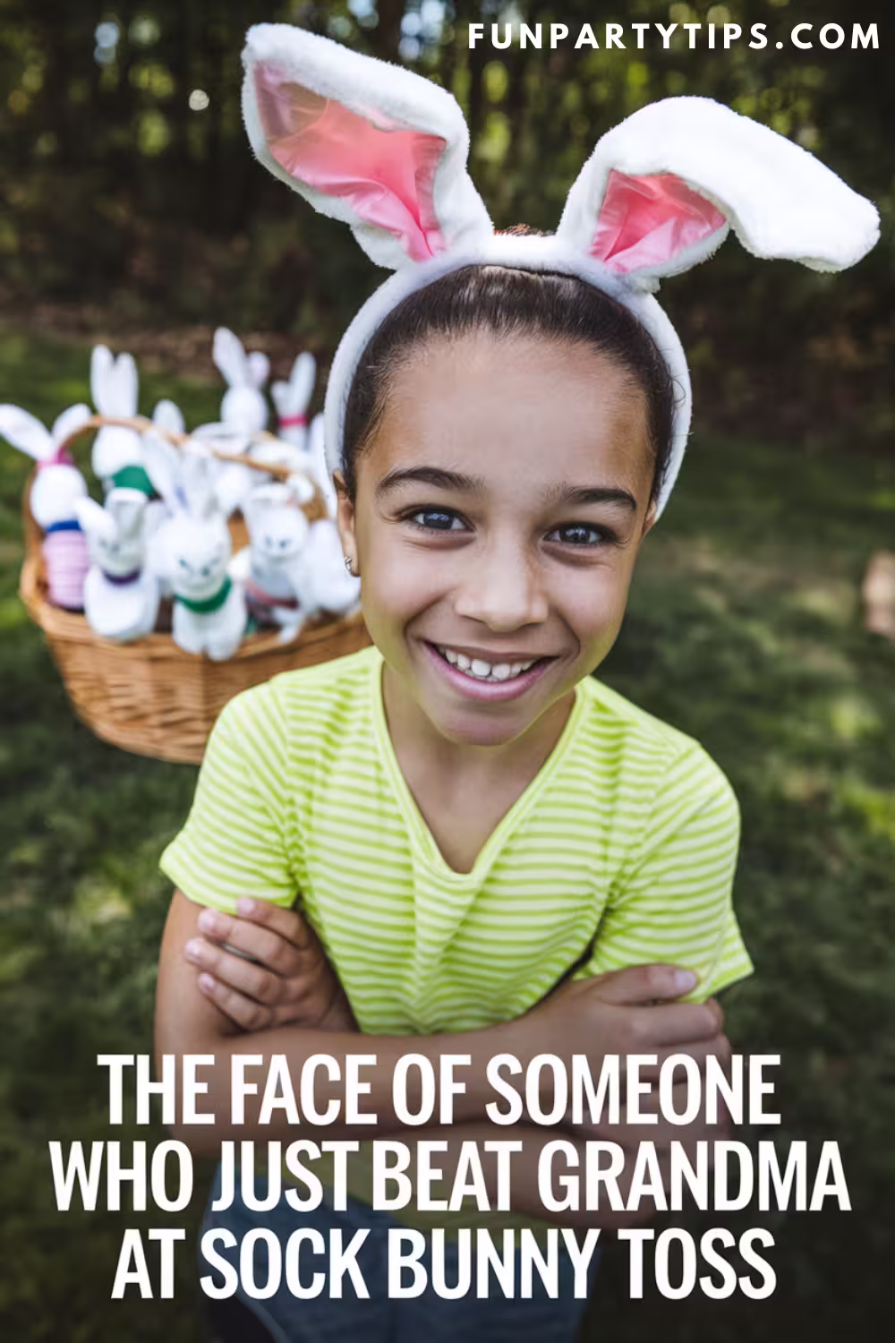 A-smiling-child-wearing-bunny-ears-with-a-basket-of-sock-bunny-toss-creations-in-the-background.-A-playful-moment-showcasing-an-easy-Easter-game-for-kids.